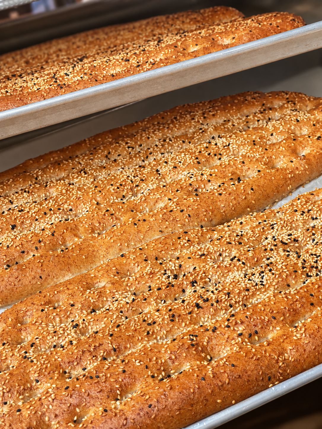 Rows of freshly baked Barbari bread made by Sara